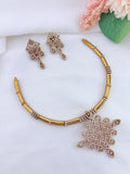 Trendy hasli pattern neckset with traditional AD kolam pendant with matching earrings