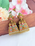 Beautifully crafted gopuram jhumka in premium matte finish adorned wtih golden beads and enamel work