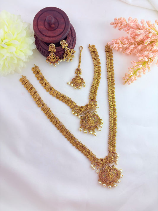Temple jewellery - Premium matte finish laskhmi pendant combo set with Tikka beautifully crafted with AD stones and pearl drops