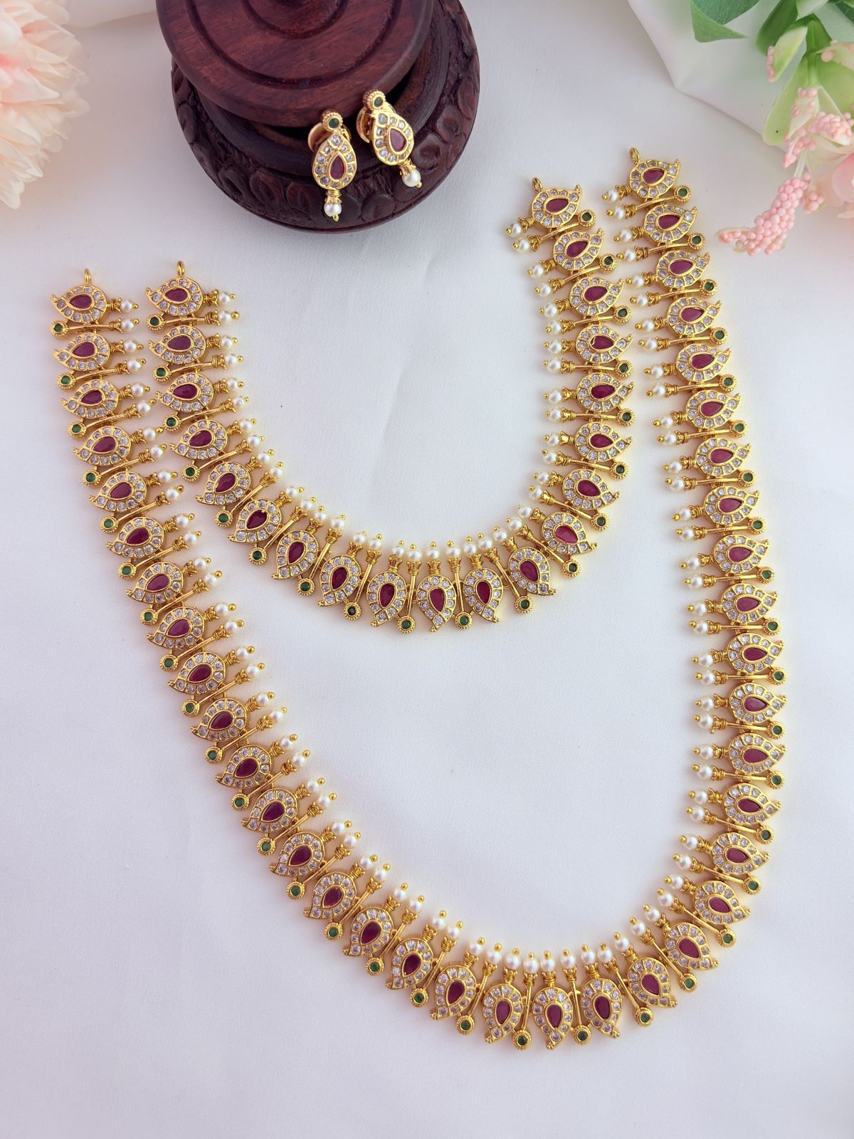 Traditional mango pattern combo set adorned with AD stones and pearls