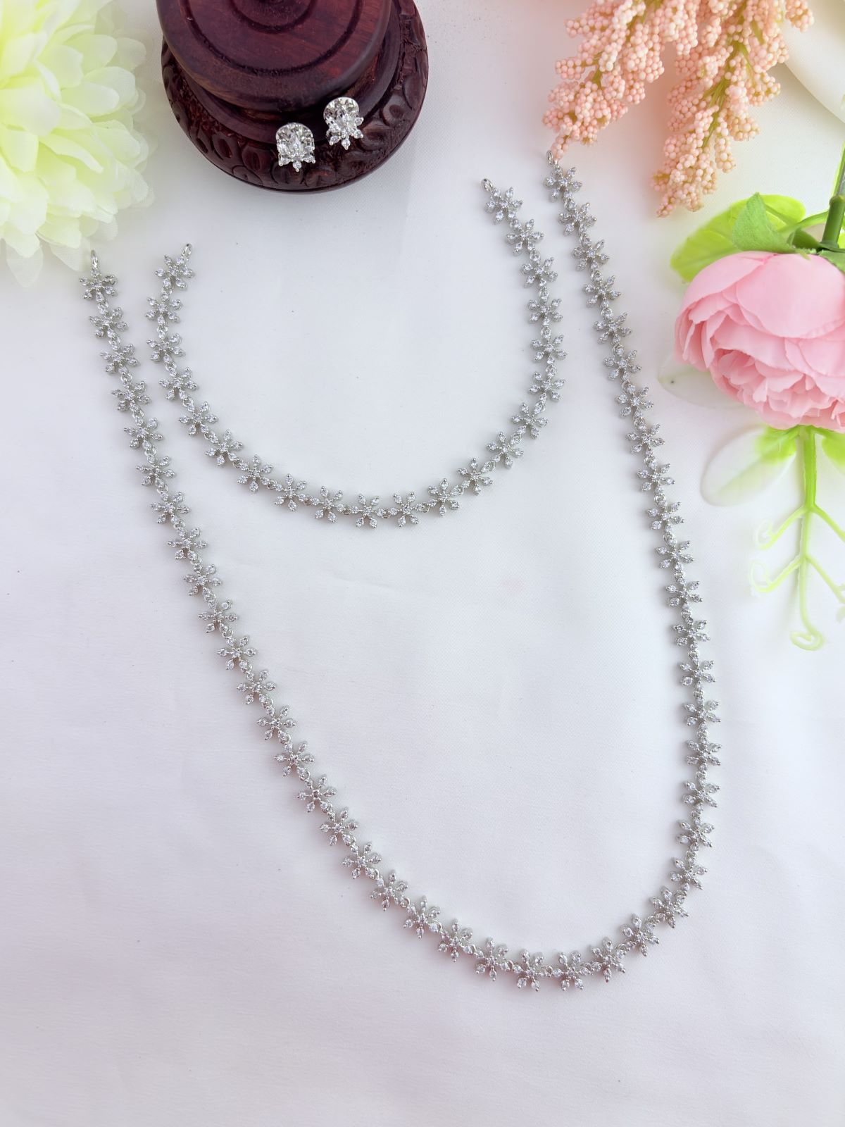 Beautifully designed floral pattern AD stone combo set in premium silver finish
