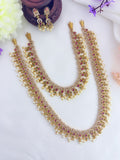 Beautifully crafted combo set  featuring dazzling AD stones, vibrant ruby and green stones with beads embellishments