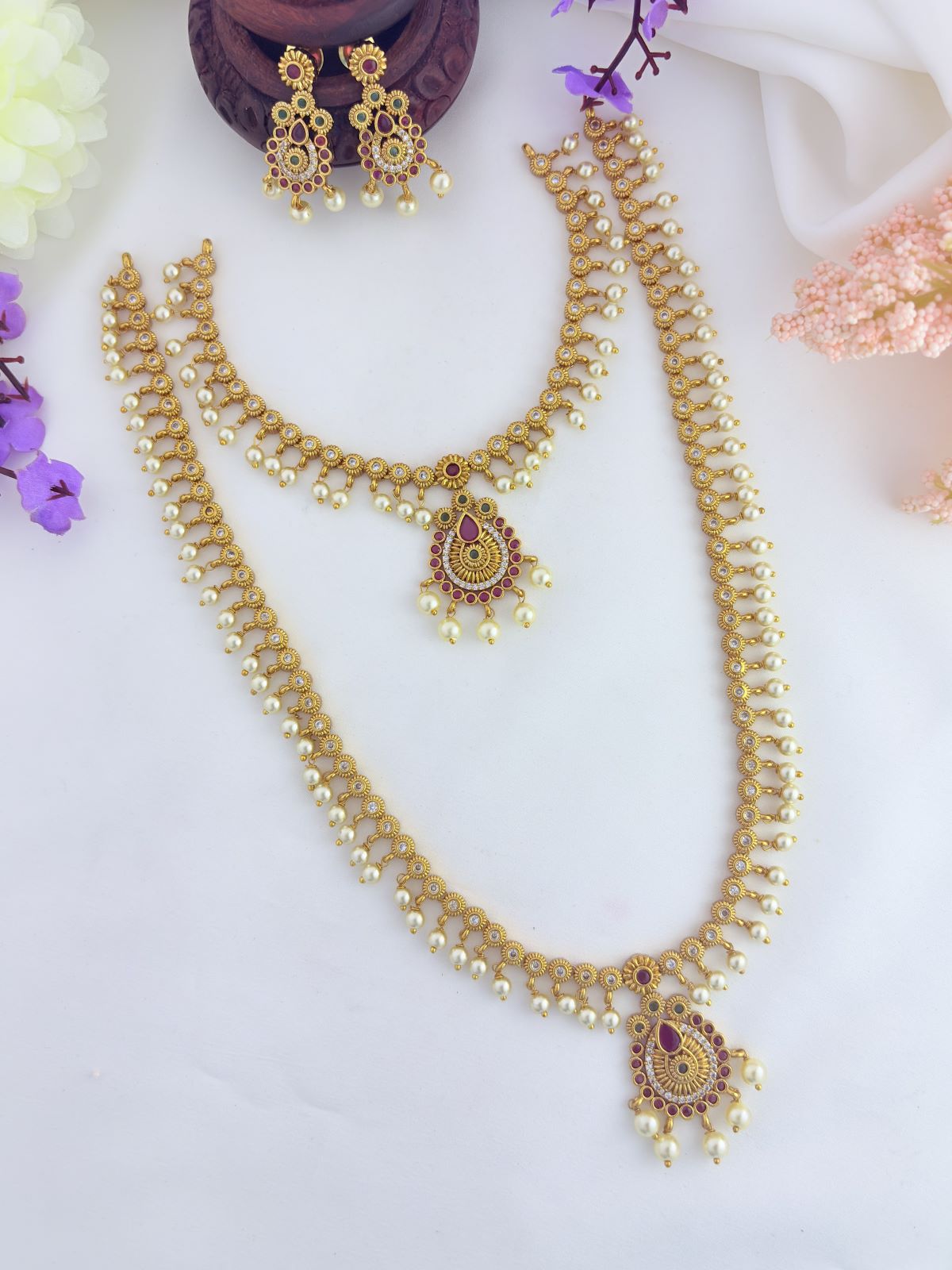 Premium matte finish combo adorned with AD stones and pearls