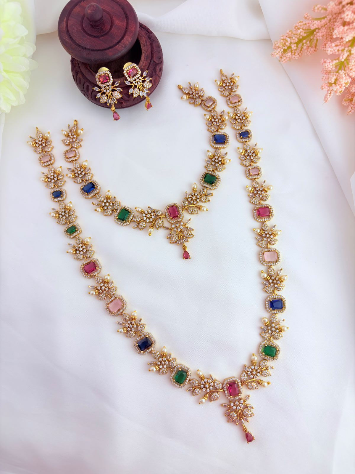 Elegant combo set featuring vibrant AD stones, pearls in premium matte finish