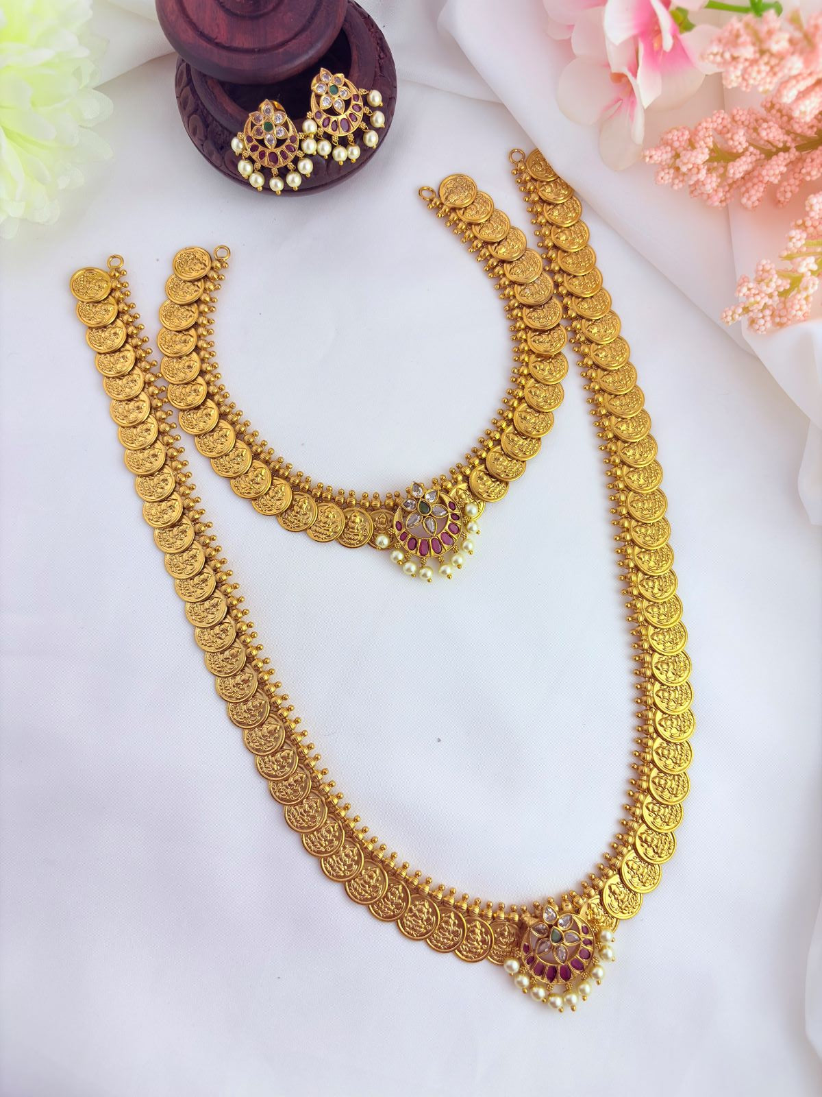 Classic kaasu maalai pattern and matching earrings beautifully adorned with AD stones and pearl drop
