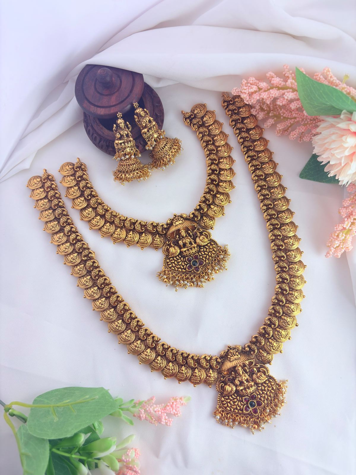Traditional lakshmi pendant combo set and earrings beautifully crafted with pearl drops