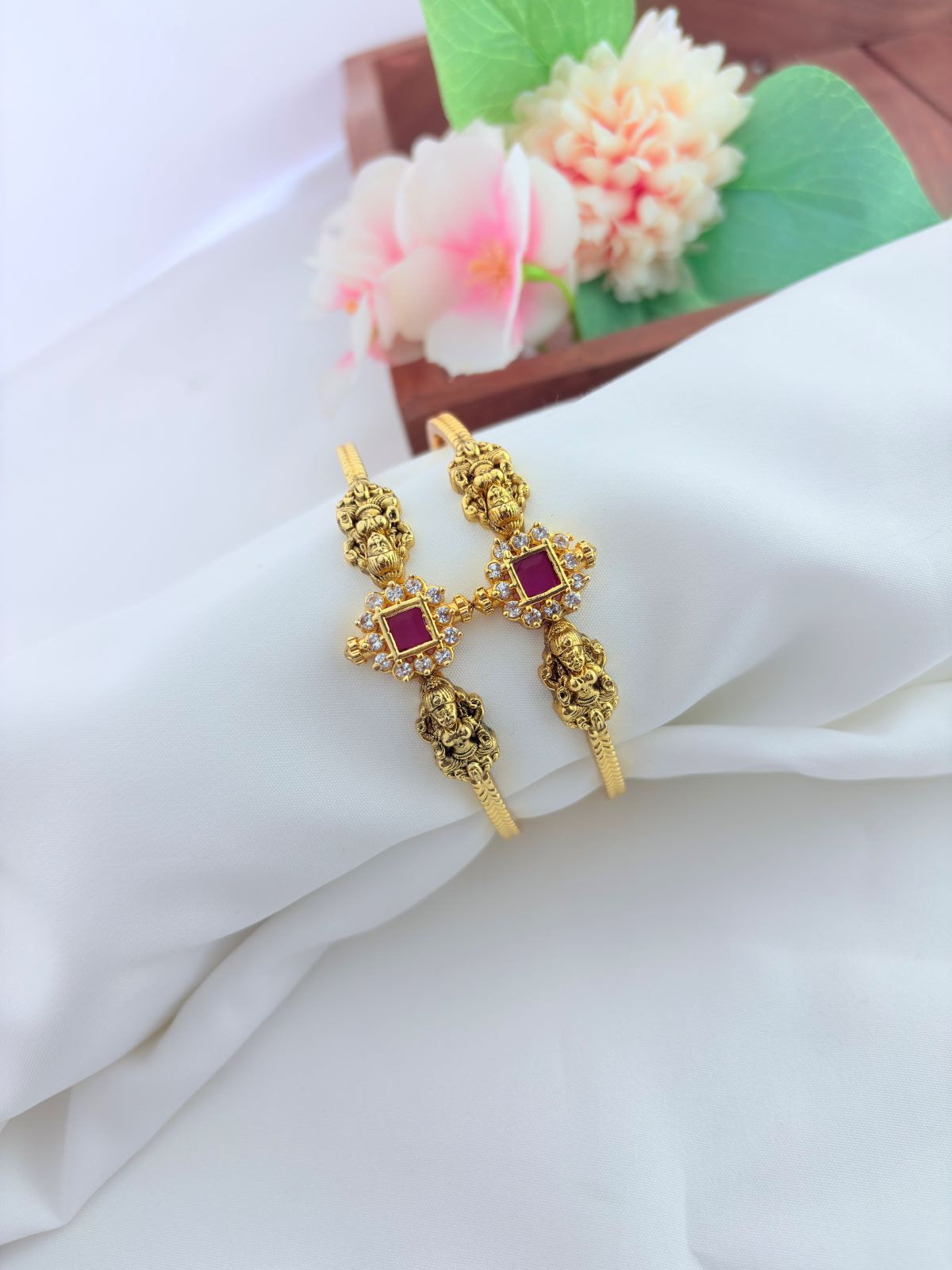 Beautifully crafted lakshmi design bangles featuring intricate traditional detailing