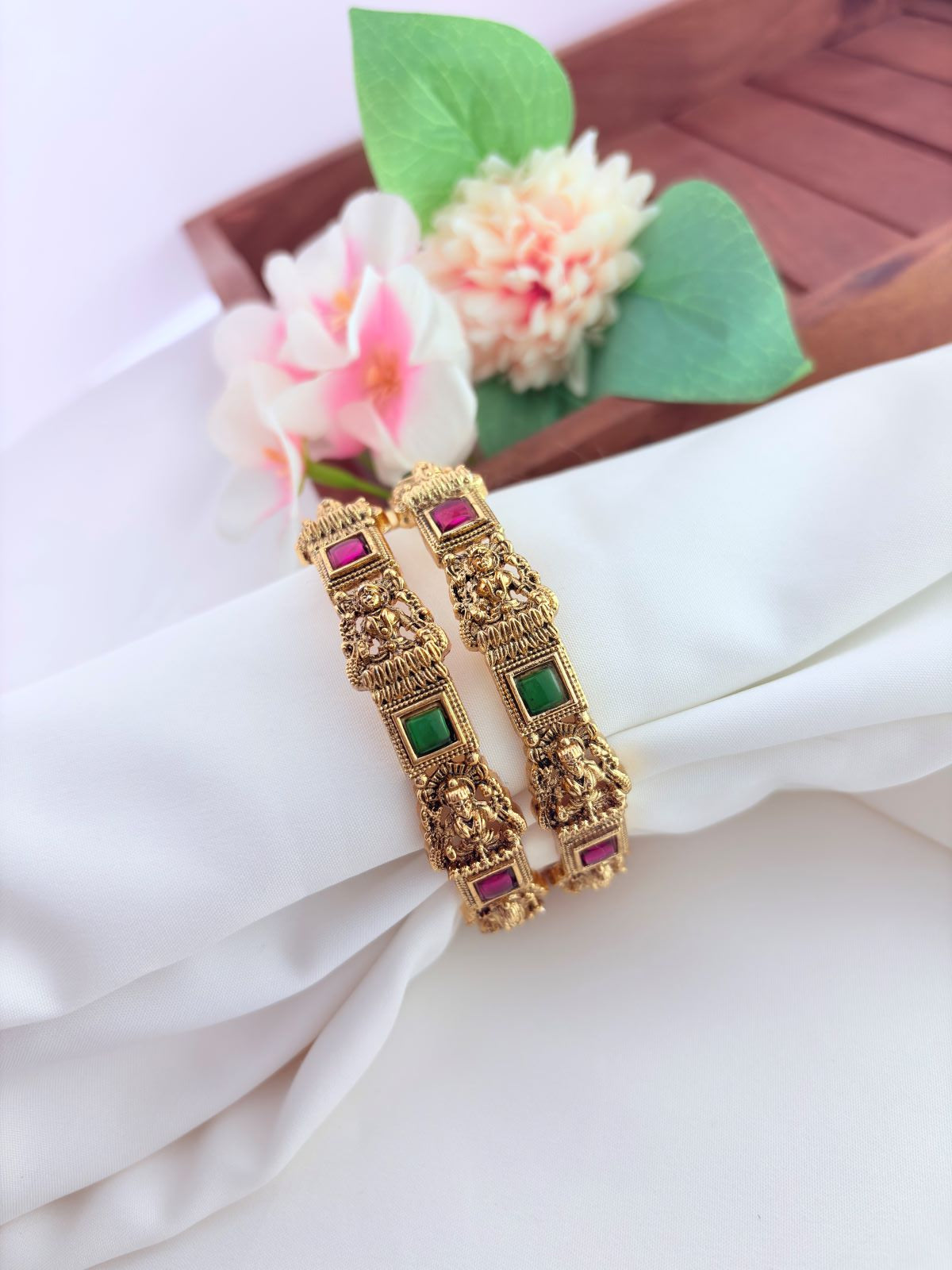 Beautifully crafted matte finish lakshmi bangles adorned with traditional detailing
