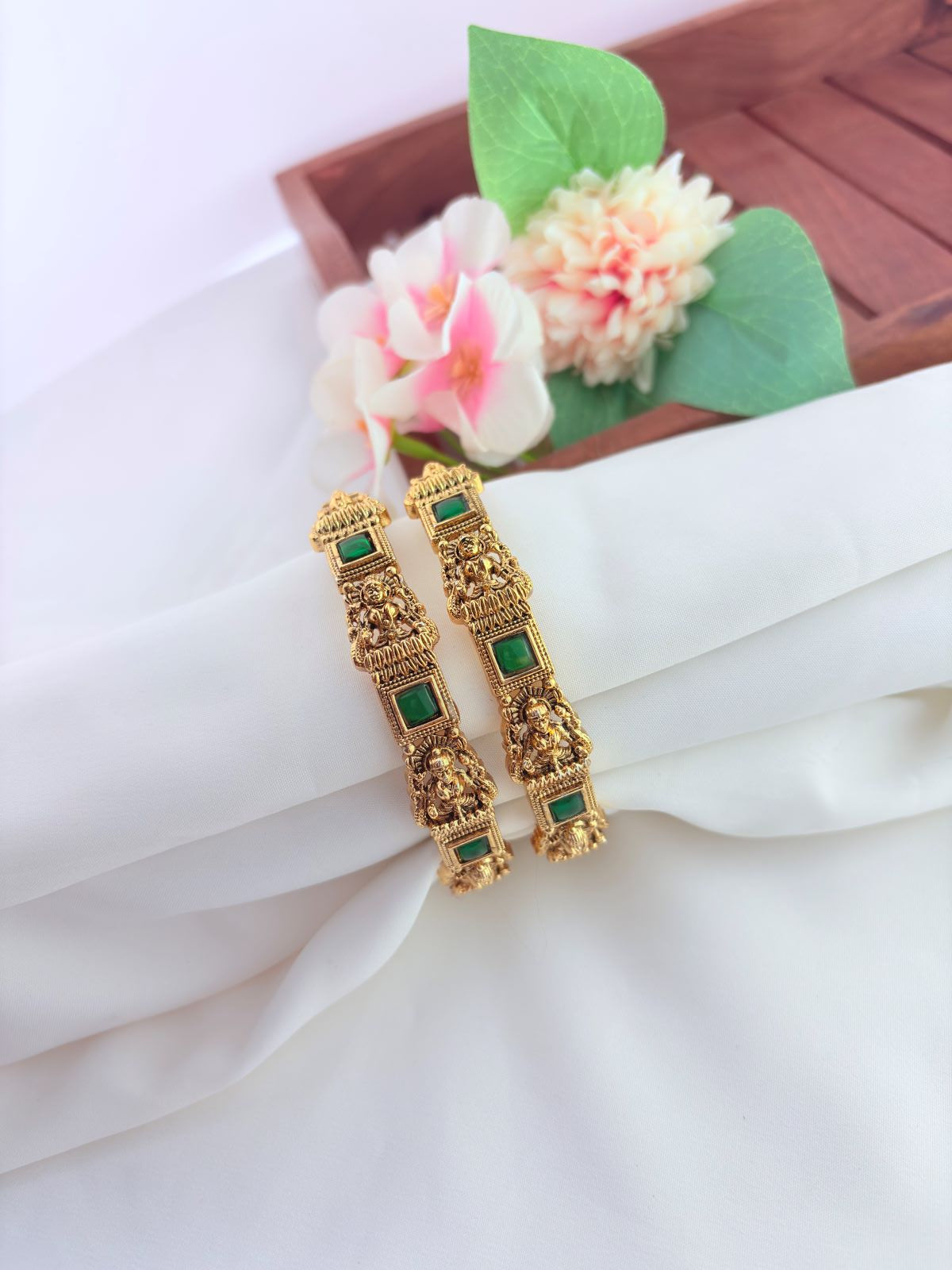Beautifully crafted matte finish lakshmi bangles adorned with traditional detailing