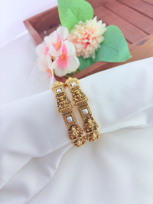 Beautifully crafted matte finish lakshmi bangles adorned with traditional detailing