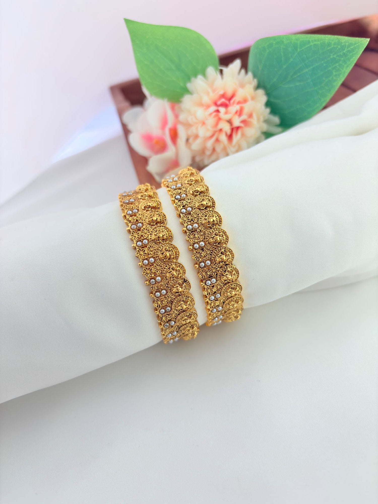 Traditional Lakshmi bangles with elegant stone work