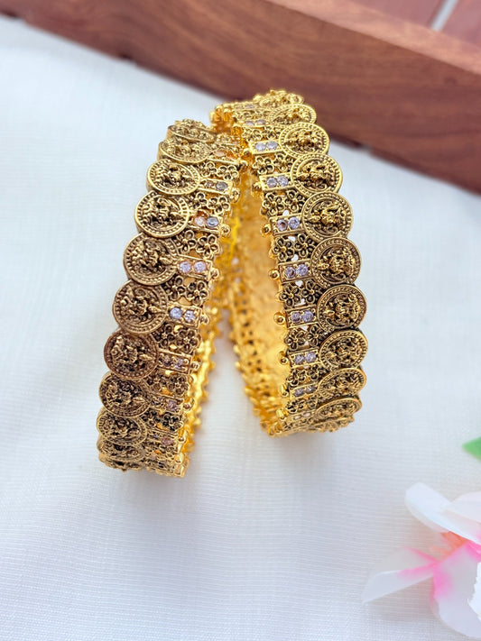 Traditional lakshmi motif bangles beautifully crafted  with AD stones