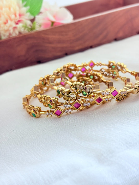 Traditional peacock design premium matte finish bangle and vibrant stone accents