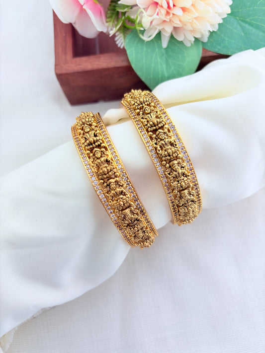 Nagas motif bangles with antique charm