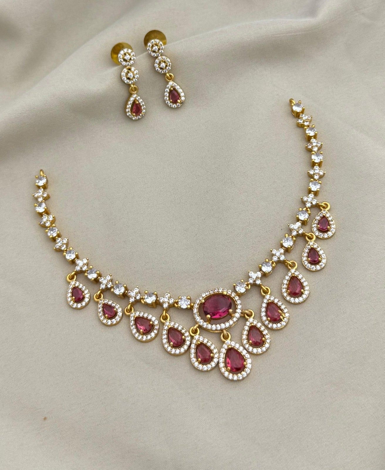 Minimal design with a premium finish necklace with matching earrings