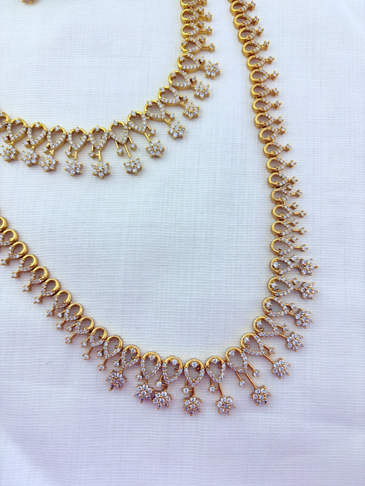 Elegant matte finish stylish pattern AD combo set with matching earrings