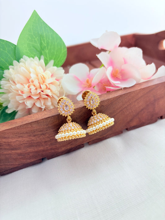 Premium matte finish jhumka beautifully crafted with classic AD stones and pearls