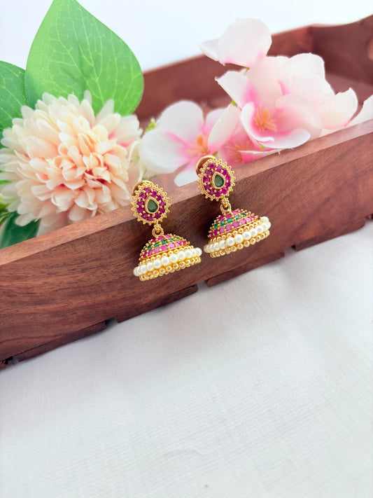 Premium matte finish jhumka beautifully crafted with classic AD stones and pearls