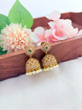 Premium matte finish AD jhumka beautifully adorned with pearl drops