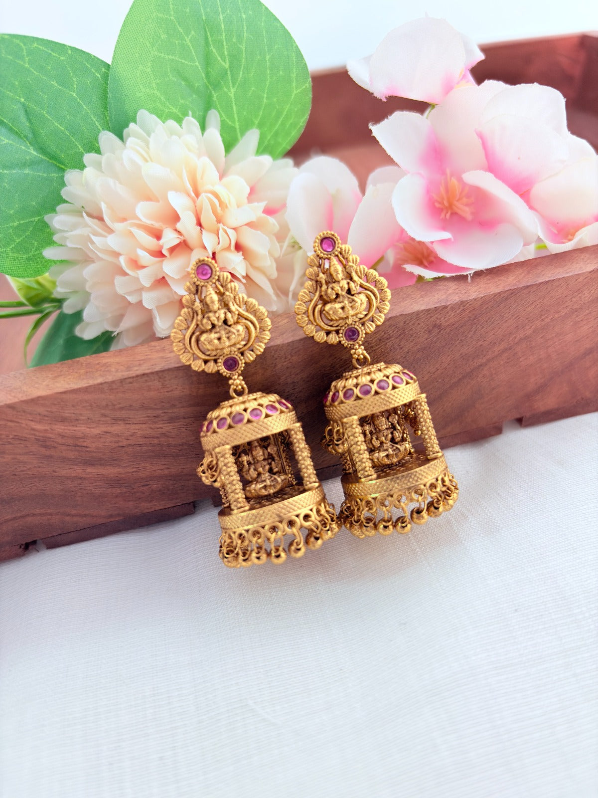 Premium matte finish temple jhumka, beautifully crafted with Lakshmi motif and graceful golden beads