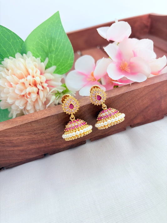 Premium matte finish jhumka beautifully crafted with classic AD stones and pearls