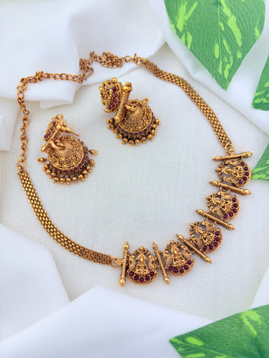 Matte finish Lakshmi choker and matching jumkha adorned with stones and golden beads