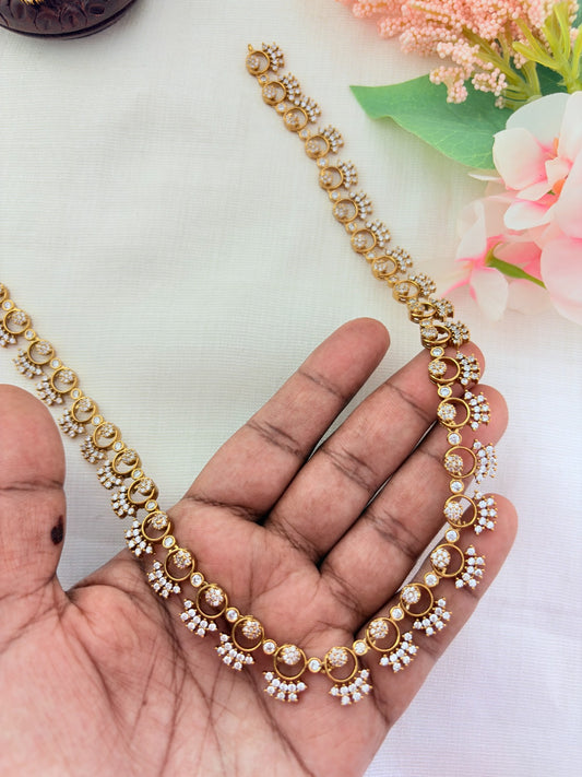 Premium matte finish haram and earrings crafted with classic AD stones