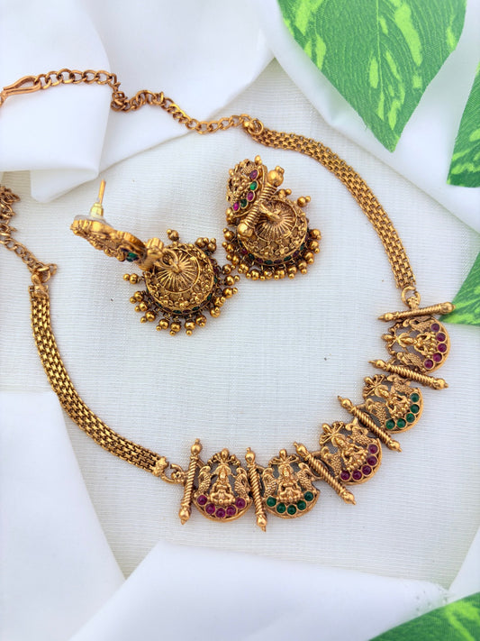 Matte finish Lakshmi choker and matching jumkha adorned with stones and golden beads
