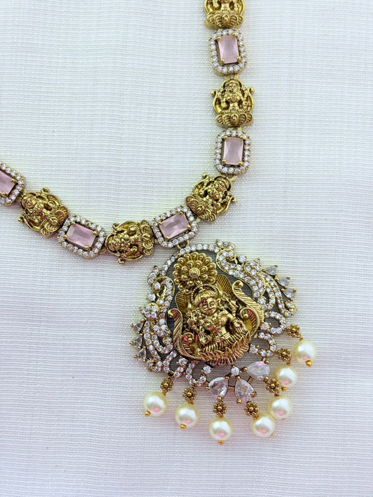 Temple jewellery - Premium matte finish Lakshmi pendant haram with stones and pearl drops