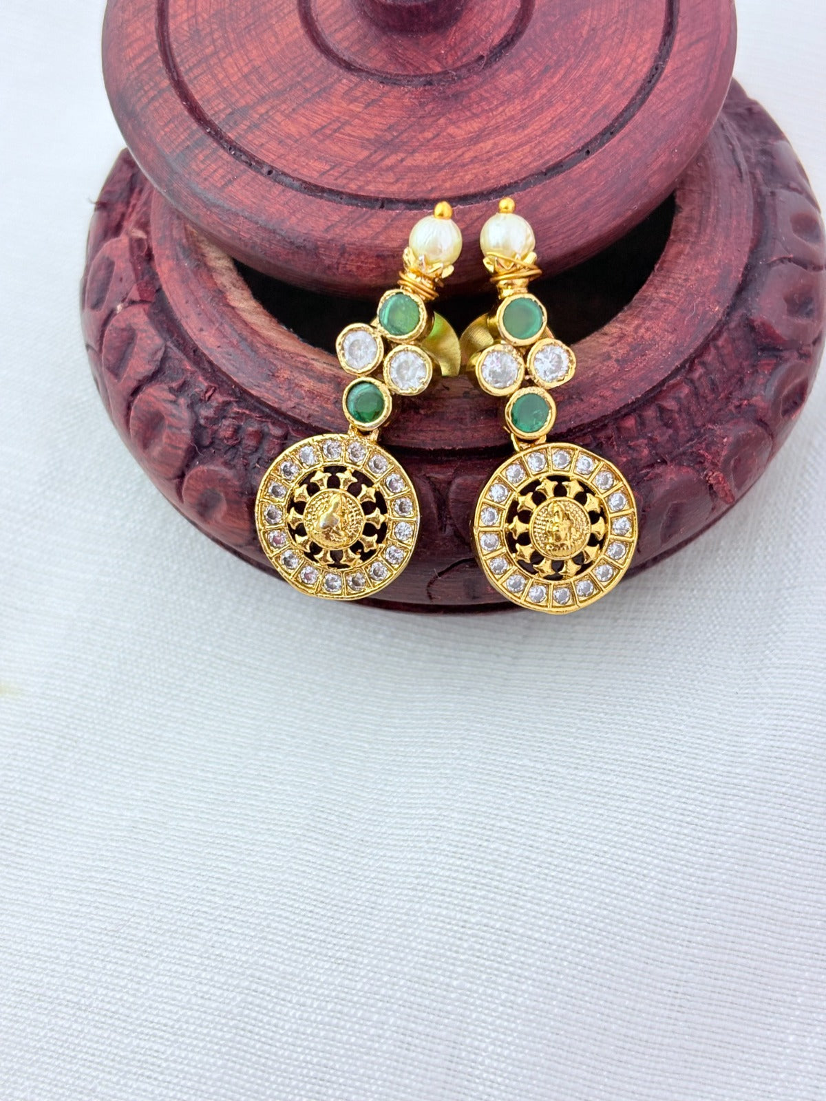 Traditional Lakshmi coin beautifully crafted with premium AD stones and pearl detailing