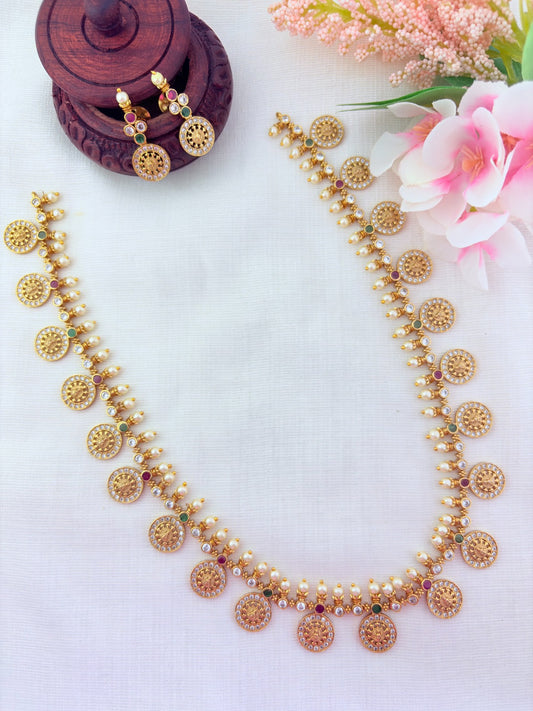 Traditional Lakshmi coin beautifully crafted with premium AD stones and pearl detailing