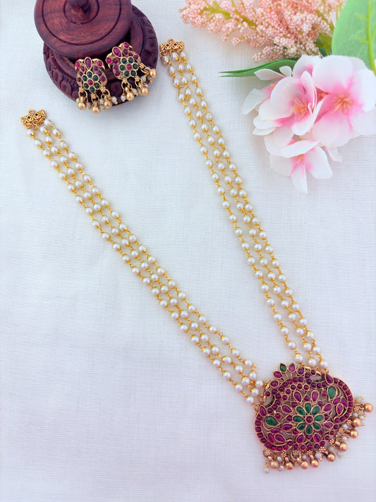 Pearl haram with pendant for a royal ethic look - Matte finish middle haram and earrings adorned with golden beads