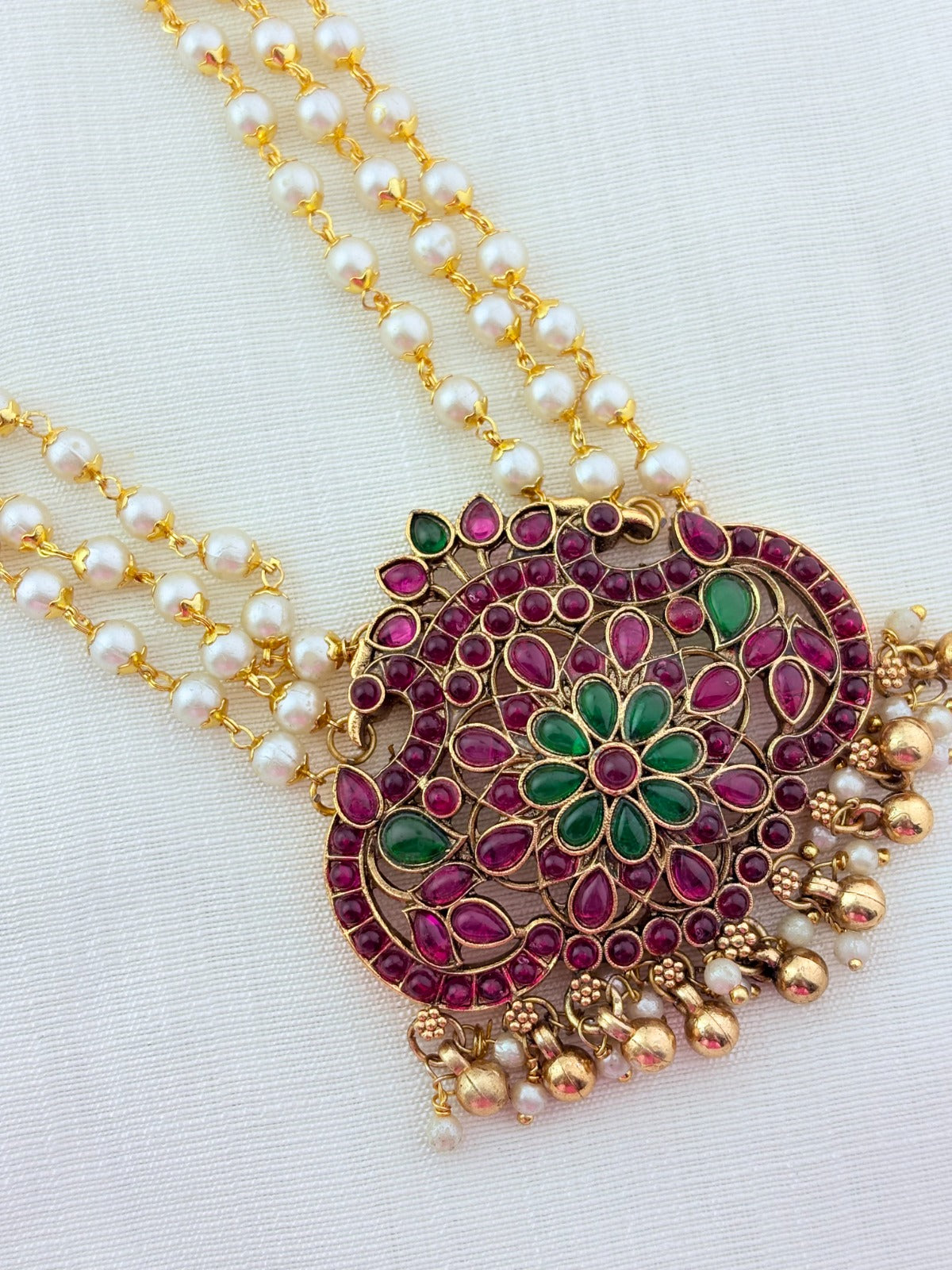 Pearl haram with pendant for a royal ethic look - Matte finish middle haram and earrings adorned with golden beads