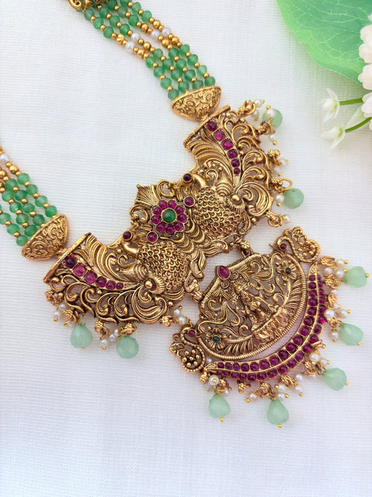 Premium matte finish peacock and Lakshmi pendant pearl haram with beads