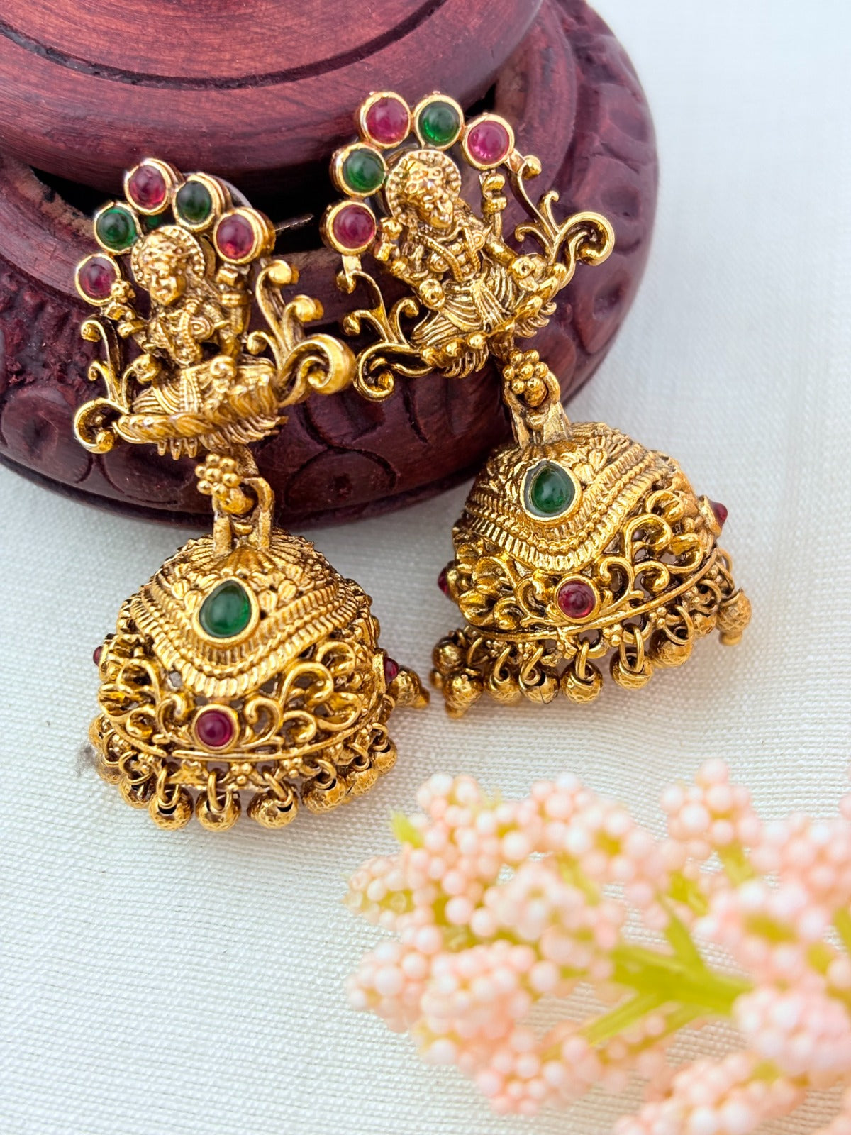 Matte finish Laskhmi coin haram with pendant and matching jumkha adorned with classic stones and golden beads