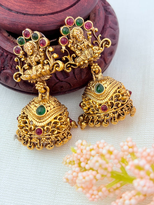 Matte finish Laskhmi coin haram with pendant and matching jumkha adorned with classic stones and golden beads