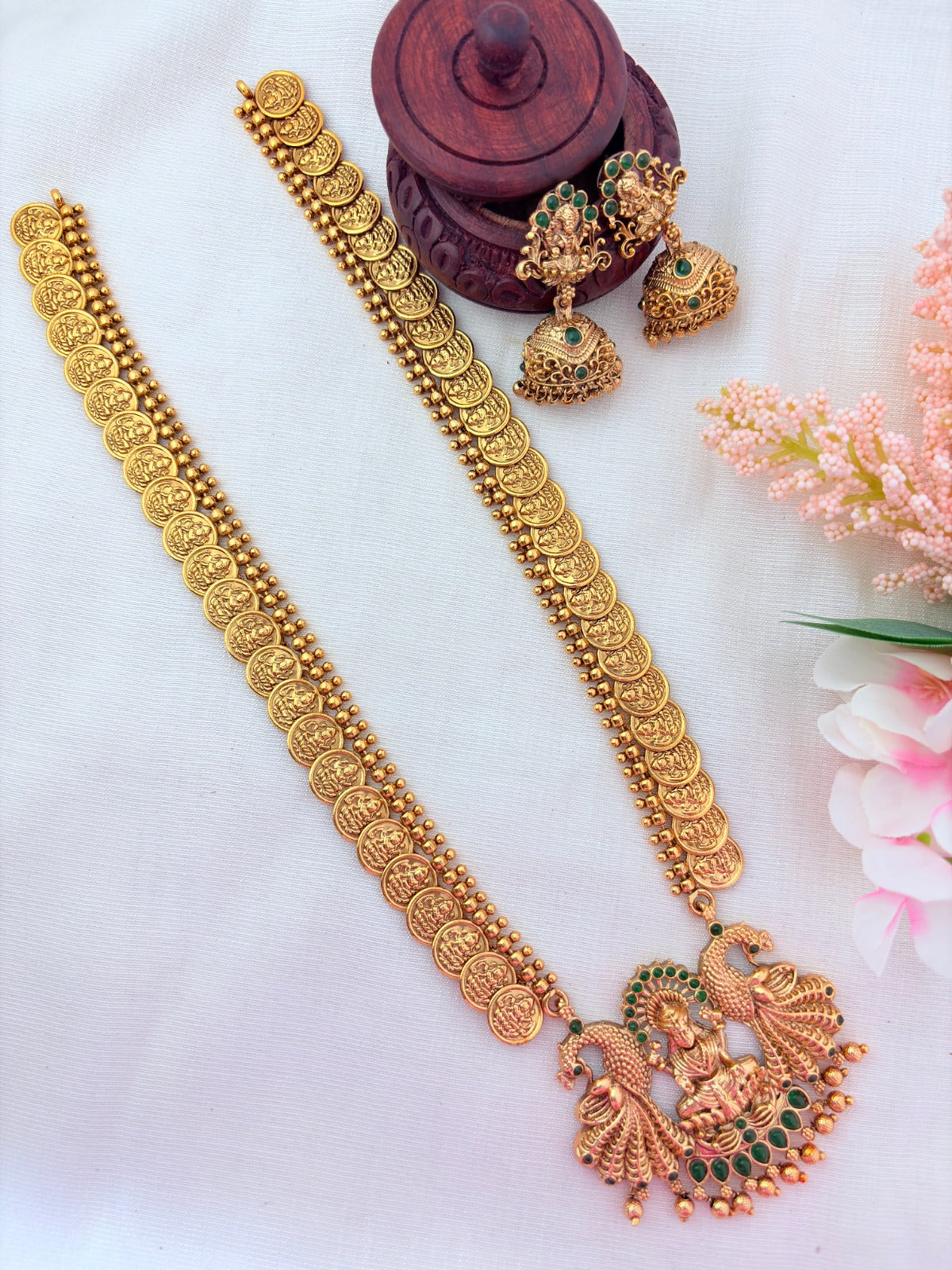 Matte finish Laskhmi coin haram with pendant and matching jumkha adorned with classic stones and golden beads