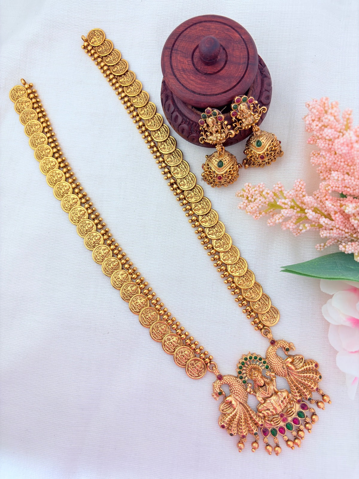 Matte finish Laskhmi coin haram with pendant and matching jumkha adorned with classic stones and golden beads