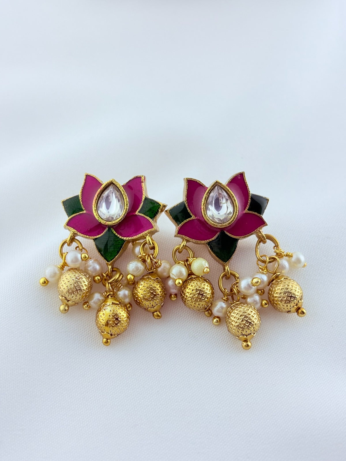 Premium lotus motif neckset highlighted with golden beads and enamel work