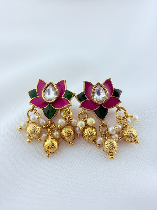 Premium lotus motif neckset highlighted with golden beads and enamel work