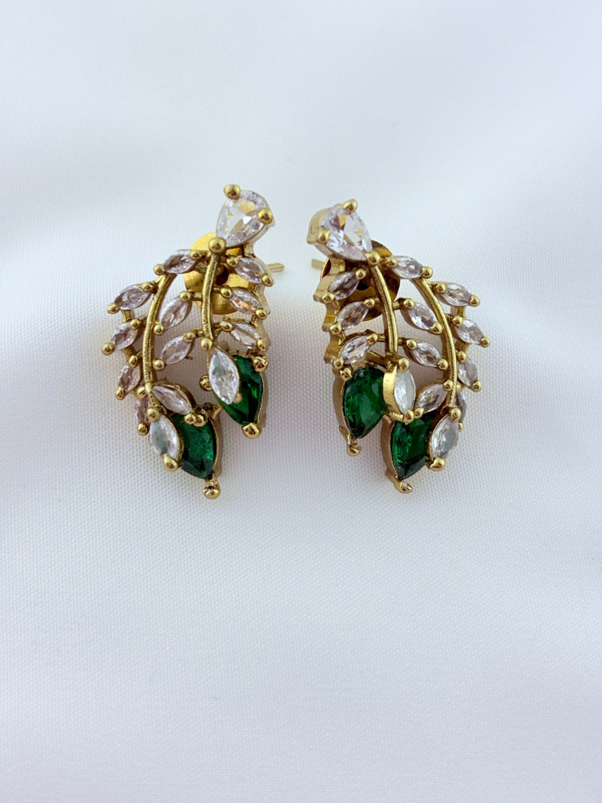 Classic CZ stone necklace featuring a refined antique finish with matching earrings