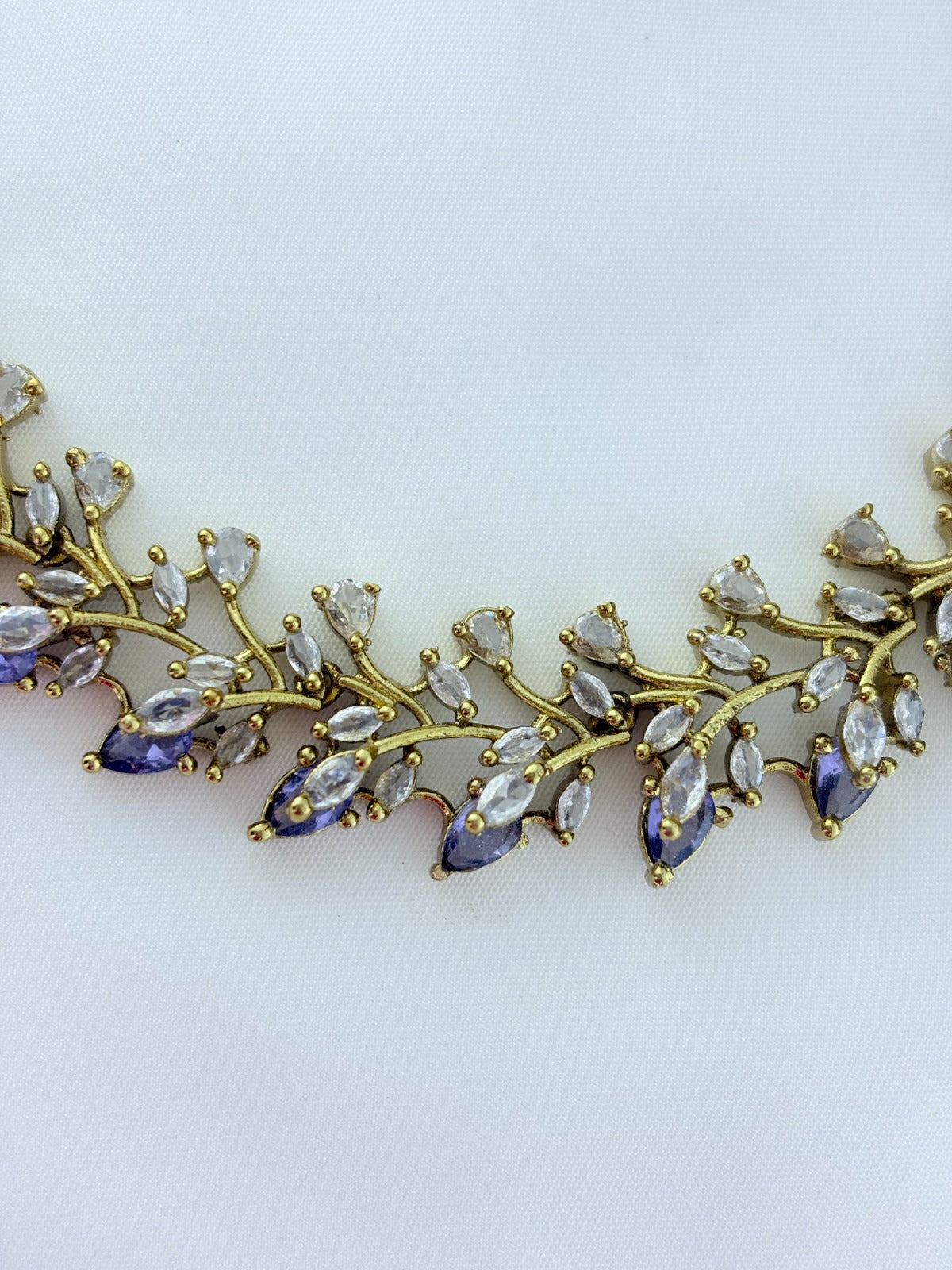 Classic CZ stone necklace featuring a refined antique finish with matching earrings