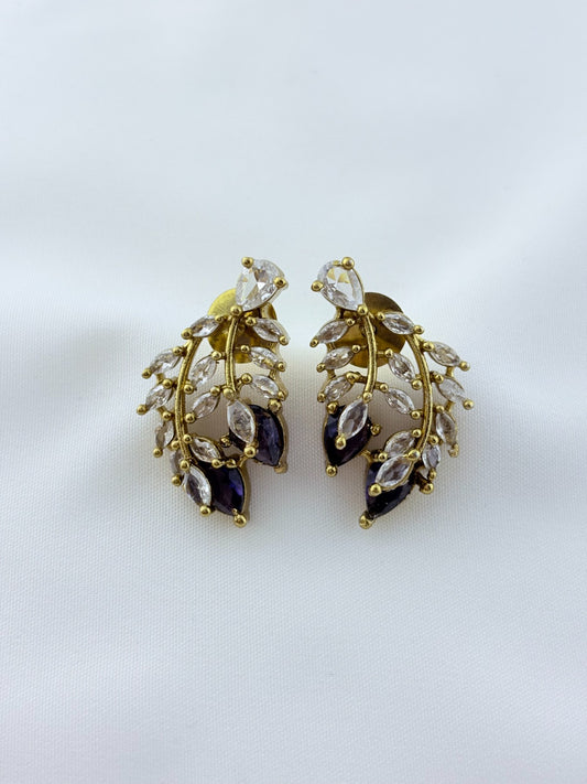 Classic CZ stone necklace featuring a refined antique finish with matching earrings