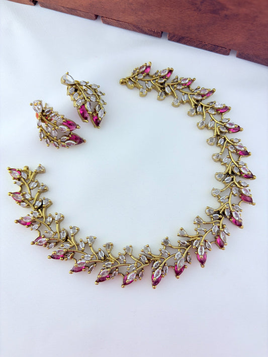 Classic CZ stone necklace featuring a refined antique finish with matching earrings