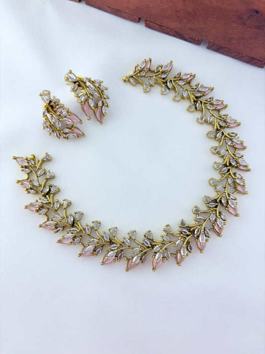 Classic CZ stone necklace featuring a refined antique finish with matching earrings