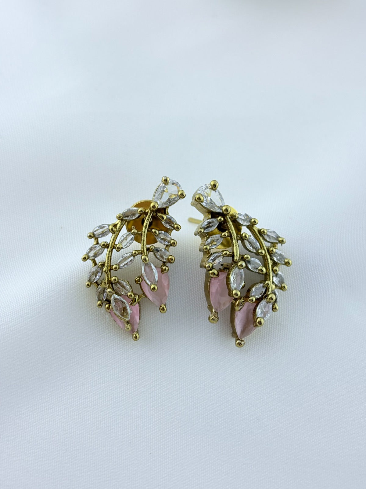 Classic CZ stone necklace featuring a refined antique finish with matching earrings