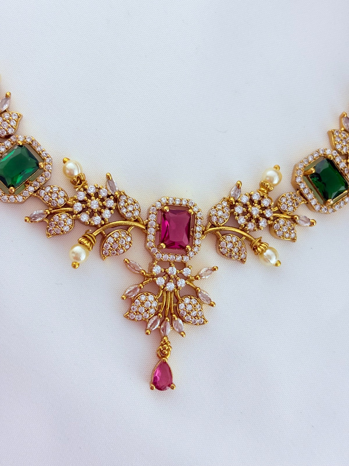 Premium matte finish neckset beautifully designed with pearls and stones