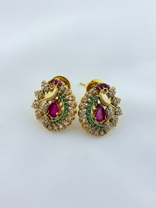 Elegant peacock motif pendant choker paired with matching earrings