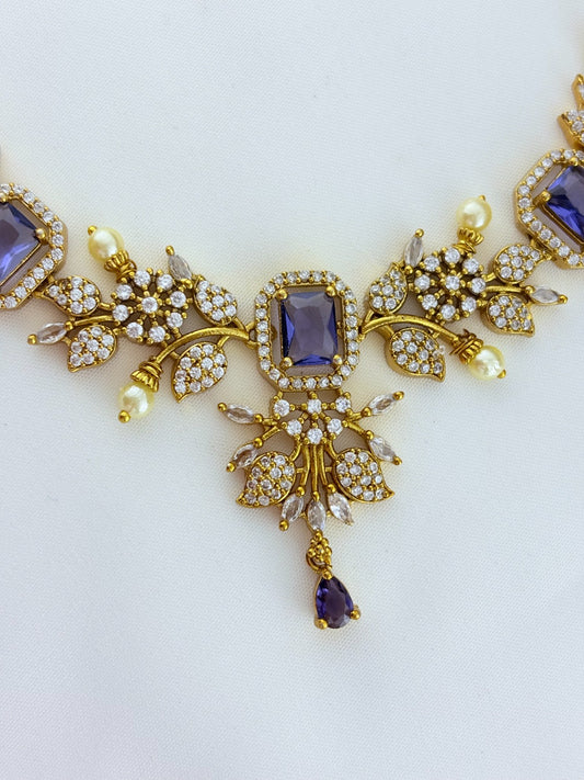 Premium matte finish neckset beautifully designed with pearls and stones