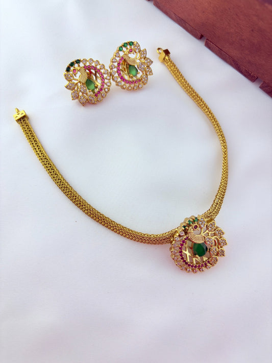 Elegant peacock motif pendant choker paired with matching earrings